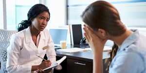 doctor-in-consultation-with-depressed-female-Patient-soc
