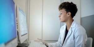 doctor-looking-at-a-computer-screen_social