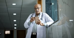 doctor-using-mobile-phone-at-hospital
